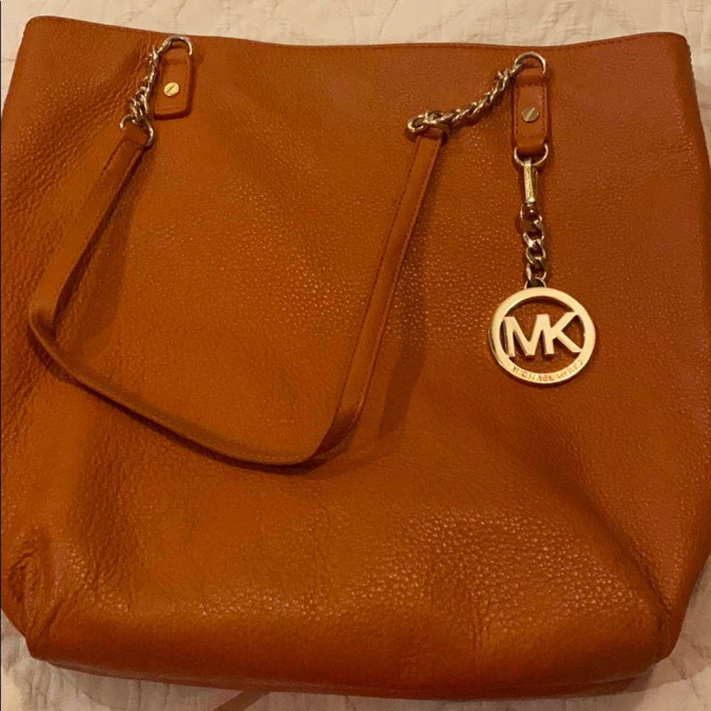 Beautiful soft orange Michael kors purse